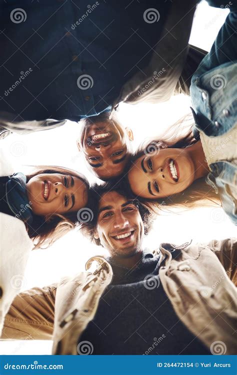 We Are Officially Stuck Together Low Angle Portrait Of A Group Of