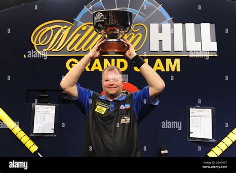 Raymond Van Barneveld Celebrates Winning The Grand Slam Of Darts Stock