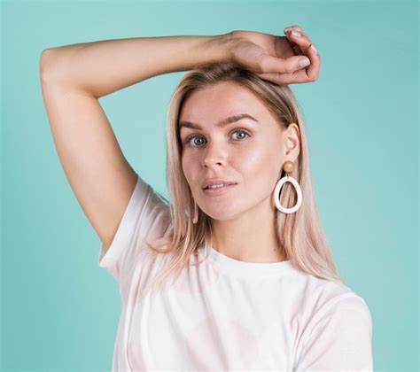 Free Photo Cute Blonde Model Posing Studio Shot