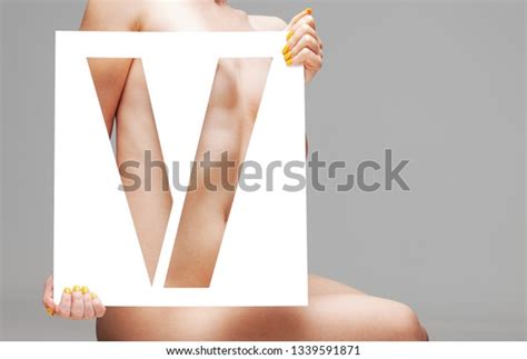 Nude Female Body Behind Stencil Letter Stock Photo 1339591871 Shutterstock