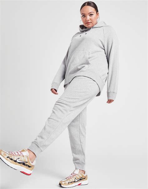 Acquista Nike Essential Plus Pantaloni Sportivi Donna In Grigio Jd Sports