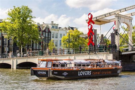 Amsterdam 1-Hour Sightseeing Canal Cruise By Semi-Open Boat: Triphobo