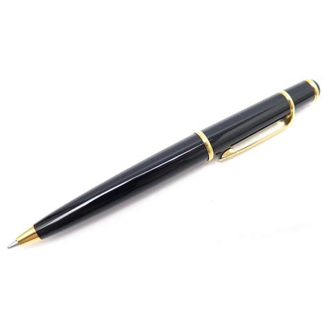 STYLO BILLE CARTIER DIABOLO EN RESINE NOIR ET PLAQUE OR BOITE BALL