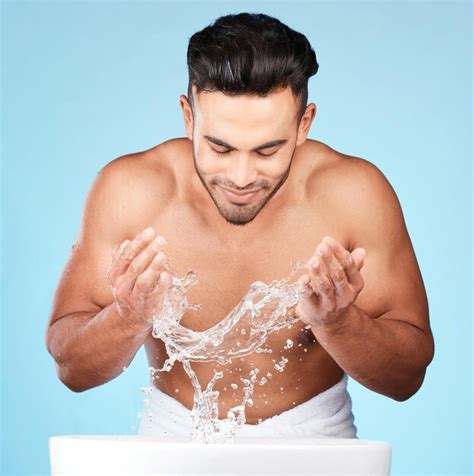 Premium Photo Face Water Splash And Skincare Of Man Cleaning In