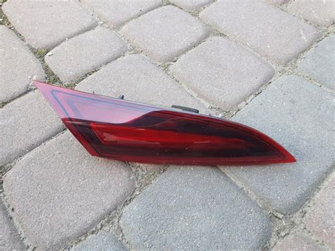 Lampa tył tylna klapa LIFT Opel Insignia 23135917