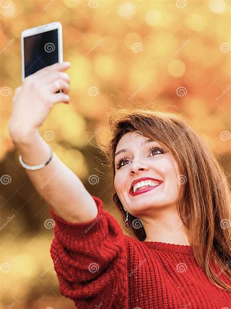 Girl Taking Self Picture Selfie With Smartphone Camera Outdoors Stock