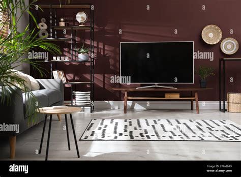 Living room interior with modern TV on stand Stock Photo - Alamy