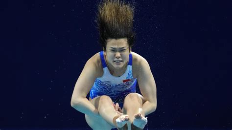 China goes 1-2 in prelims of women's springboard diving | AP News