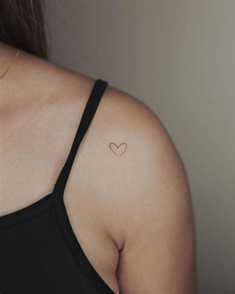 Minimalistic Heart Tattoo Located On The Shoulder