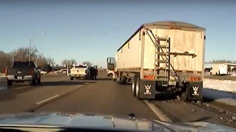 Video Hero Cop Jumps On Runaway Semi Truck Saves Driver The Drive