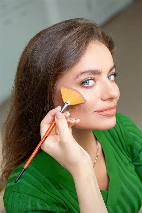 Make Up Artist Applying Professional Make Up Of Tonal Foundation Stock