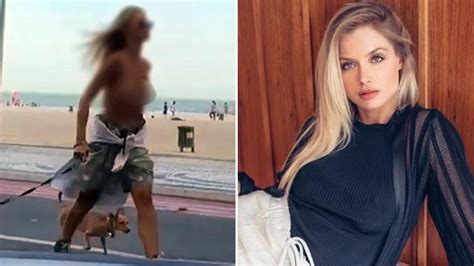 Modelo Presa Ao Passear De Topless Em Praia Em Sc Pi H