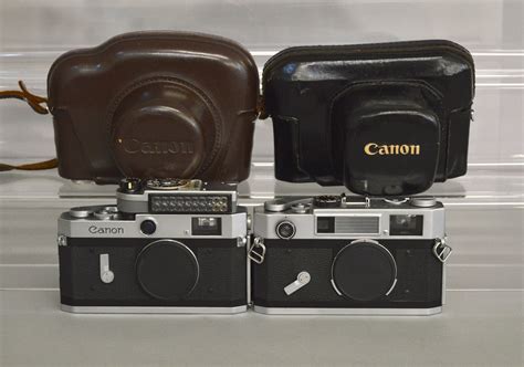 Two Canon Rangefinder Camera Bodies And Cases Comprising Canon 7s With