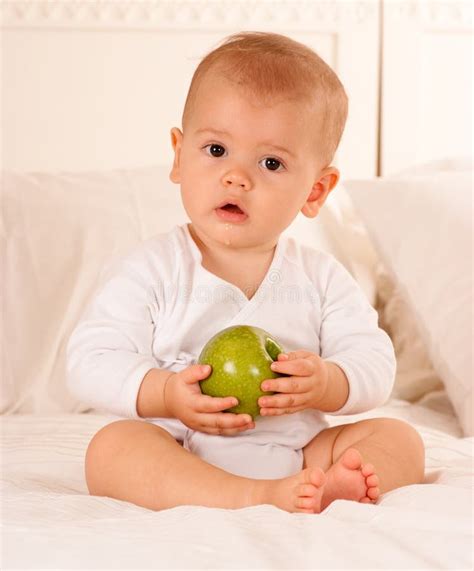 Baby and fruit stock photo. Image of child, childhood - 20191172