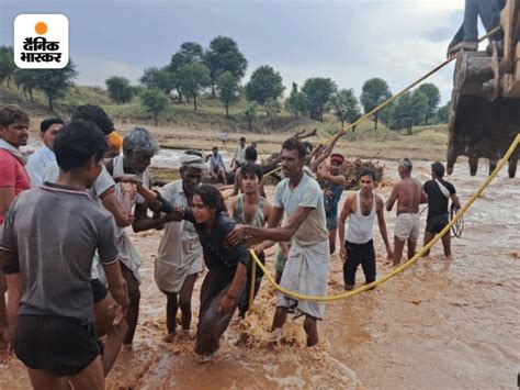 Rajasthan Heavy Rainfall Rescue Operation 6 Trapped In Drain In