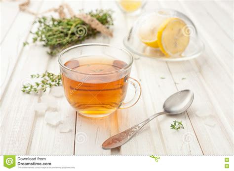 Herbal Tea In Glass Cup With Thyme On White Stock Photo Image Of