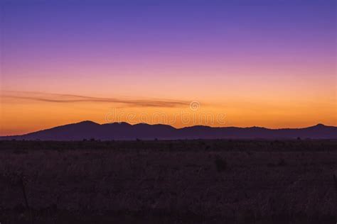 Mountains with a Sunset Sky Stock Image - Image of beach, lights: 106364637