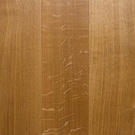 Closeup Of The Wood Grains On A Wooden Flooring Paneled In Light Brown