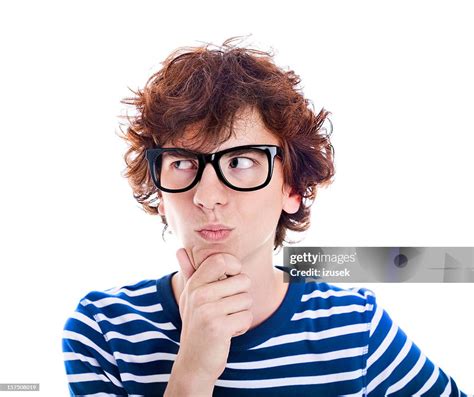 Nerdy Teenager Thinking Studio Portrait High Res Stock Photo Getty Images