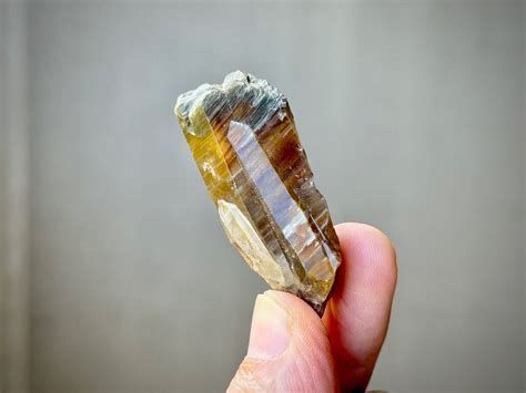 Red Amphibole Quartz With Wispy Yellow And Blue Gray Amphibole Third