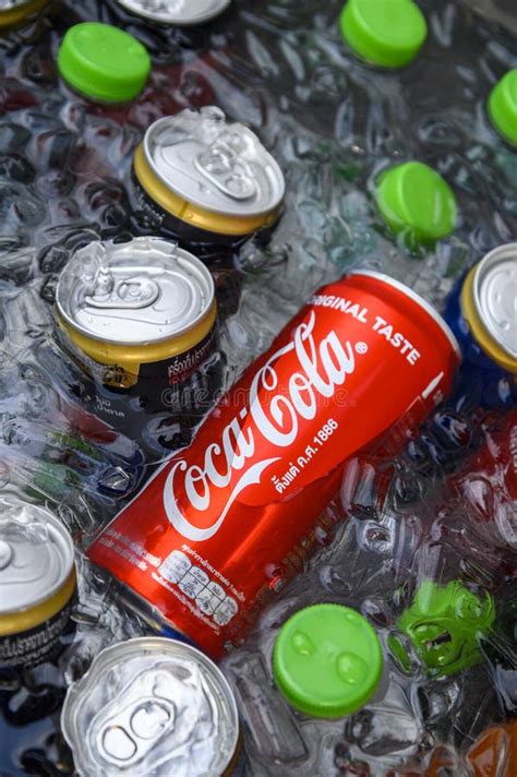 Coca Cola Can And Ice Soft Drink Cans On Ice In The Bucket Editorial