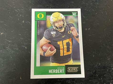 Sold at Auction: 2020 Panini Score Justin Herbert RC