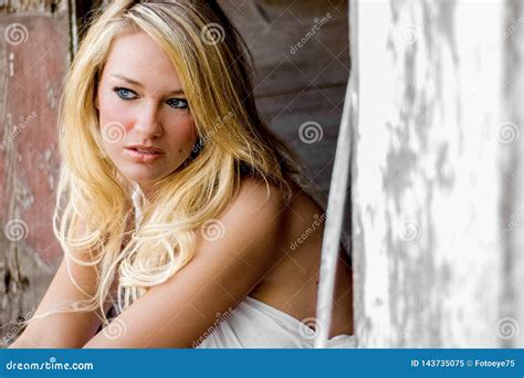 Blonde Girl Woman Dressed As Farm Country Or Cowgirl Stock Image