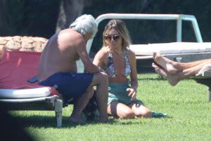 Swimwear Abbey Clancy Displays Her Washboard Abs In A Frilly Bikini In Sardinia