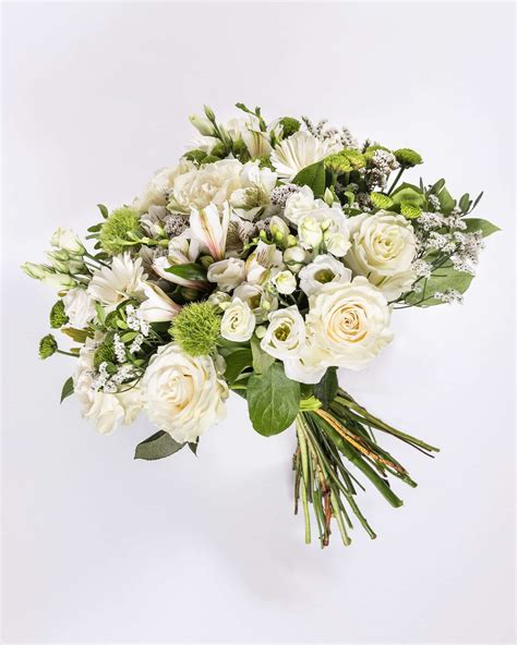 Bouquet de fleurs rond du fleuriste à dominante de blanc Autant de