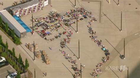 Taylor Swift fans line up for tour merch outside US Bank Stadium ...