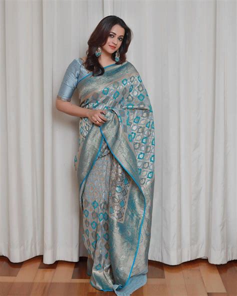 bhavana menon dolls    sky blue silk saree   wedding