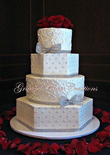 Elegant White Butter Cream Wedding Cake With Silver Bling Ribbon And