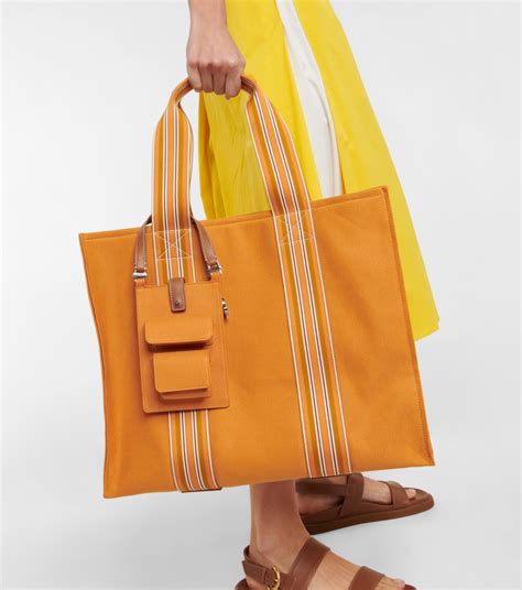 The Suitcase Stripe Canvas Crossbody Bag In Orange Loro Piana Mytheresa