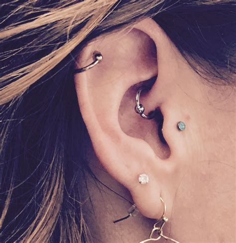 Daith Tragus And Helix Piercing Ear Piercings Helix Cartilage