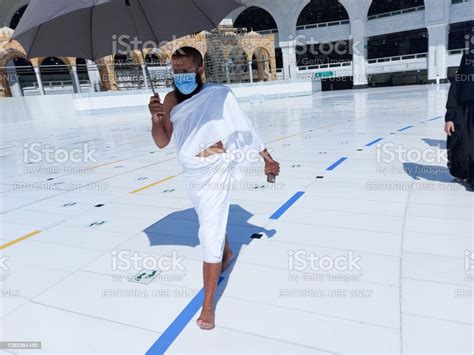 Pilgrims Circle The Kaaba In Masjid Alharam Stock Photo Download