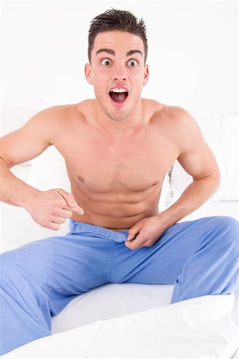 Handsome Half Naked Man Having Problems With Genitals And Potency Stock