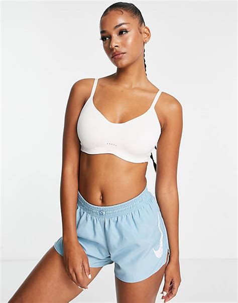 Nike Training Dri Fit Alate Minimalist Light Support Padded Bra In Light Pink Asos