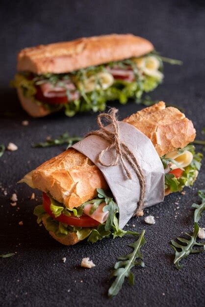 Premium Photo Baguette Sandwich With Cheese Ham Tomatoes And Vegetables