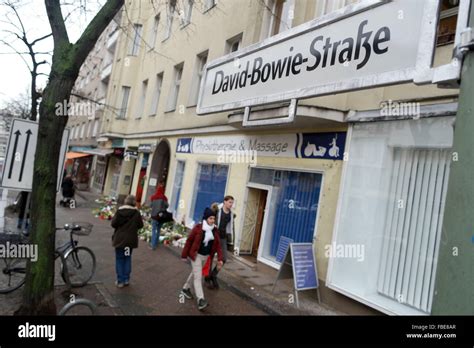 A Provisional Street Sign For David Bowie Street Is Seen In Front Of