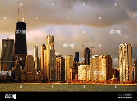 The Chicago skyline rises with storm clouds developing behind it Stock ...