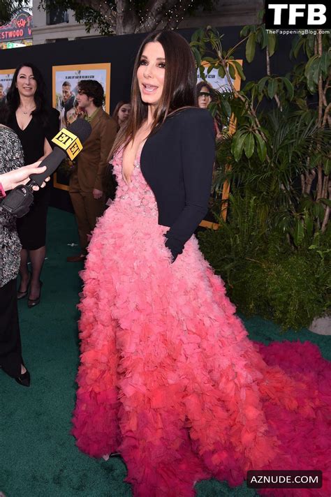 Sandra Bullock Sexy Seen Showing Off Her Hot Cleavage In A Pink Gown At The Lost City Premiere