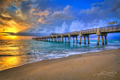 Juno Beach Fishing Pier During a Stormy Sunrise Over Atlantic