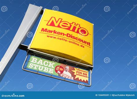 Netto Marken Discount Sign With Inhouse Bakery Against Blue Sky