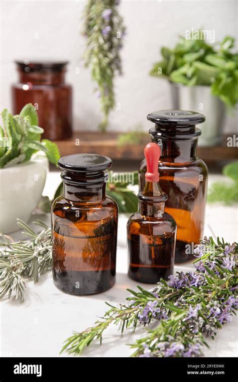 Herbal Essential Oil On Vintage Apothecary Bottles Stock Photo Alamy