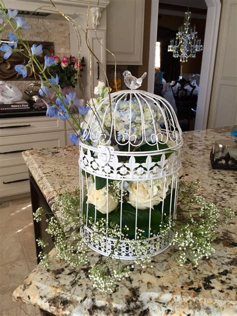 Birdcage Centerpiece Blue Hydragea White Roses Flower Arrangements