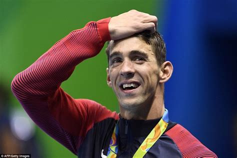 American Swimmer Micheal Phelps Wins His 19th Gold Medal Photos