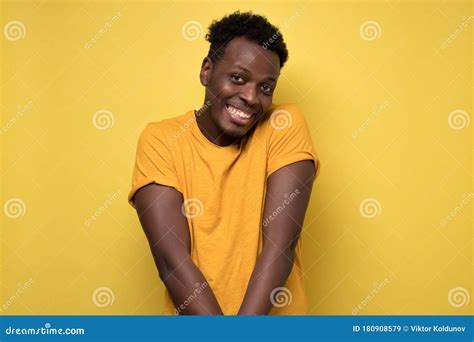 African American Man in Yellow Clothes, Smiling Broadly Stock Image ...