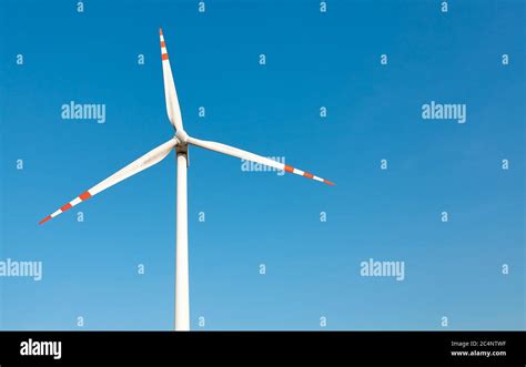 Wind Turbine Against The Blue Sky Stock Photo Alamy