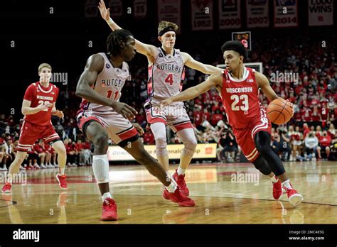 Wisconsin Guard Chucky Hepburn 23 Drives To The Basket Past Rutgers