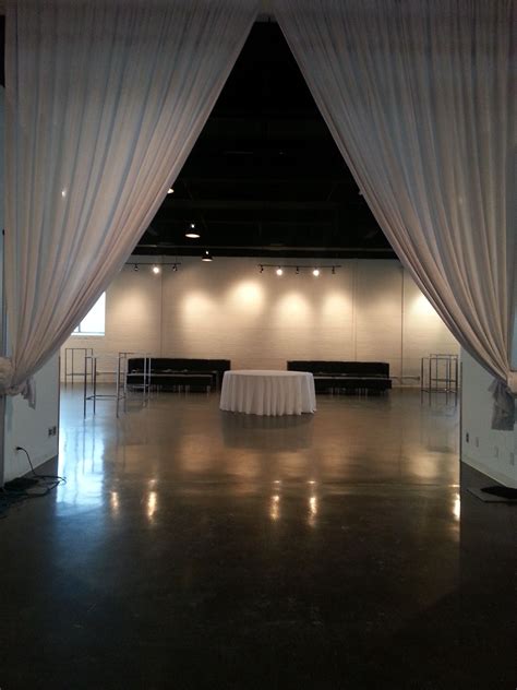 Setting Up For A Party At The Warehouse Event Venue Black And White